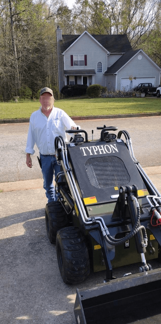 Compact skid steer customer pickup photo